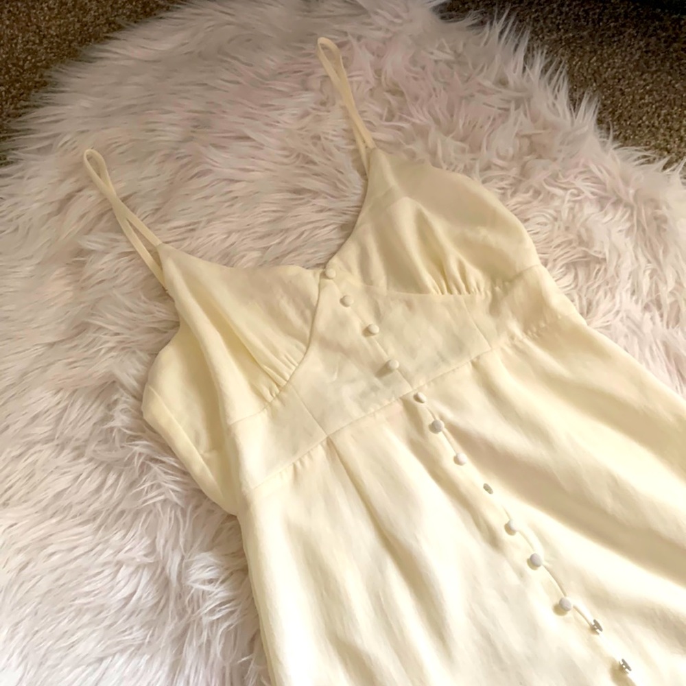 Beautiful cream colored dress. Never worn. Size small.